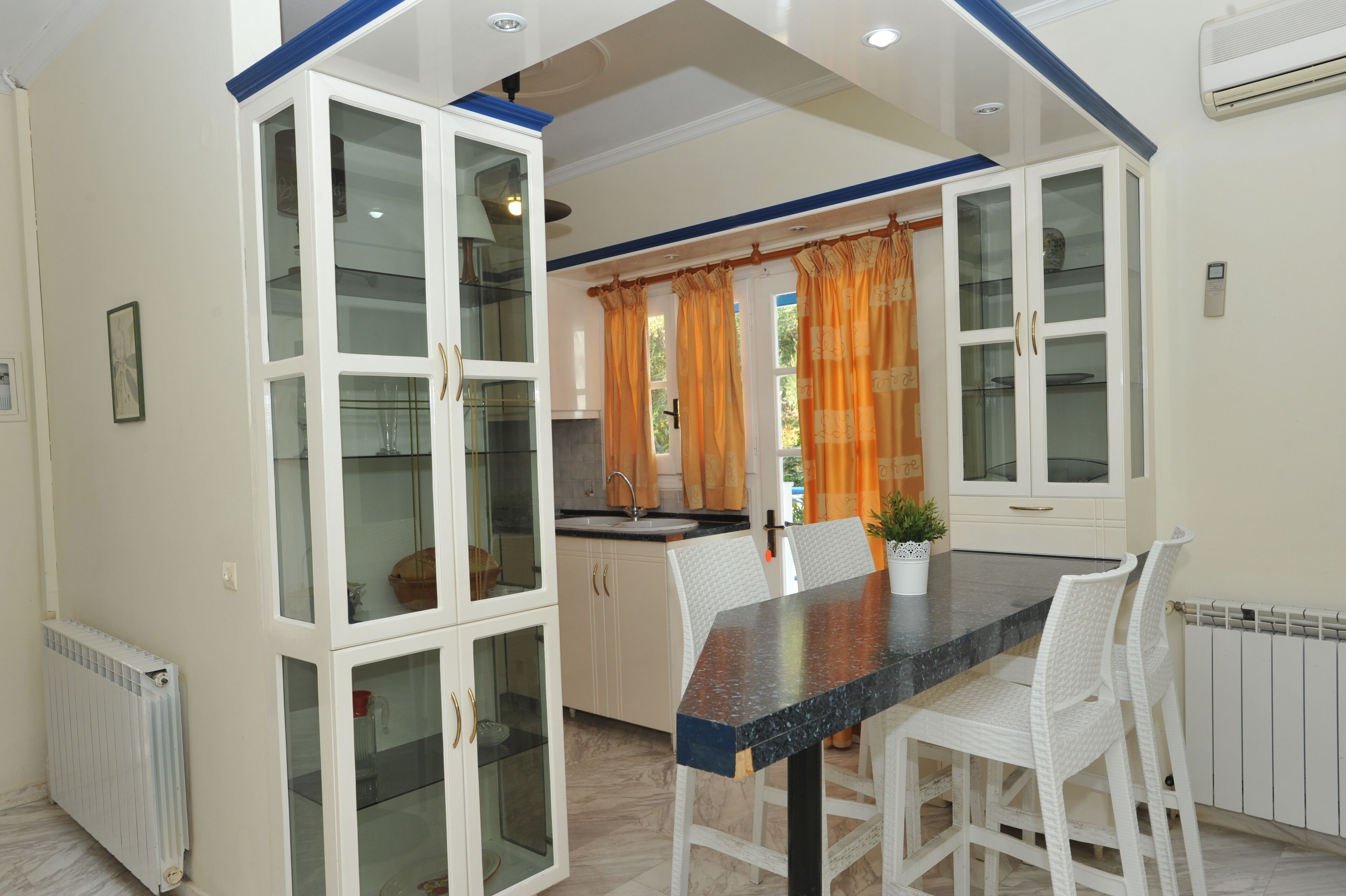 Standard Apartment | Living area | 12-inch flat-screen TV with digital channels, TV