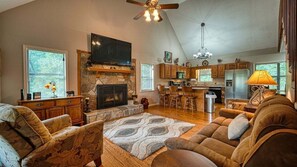 Televisio, takka, videopelejä, pöytätennispöytä