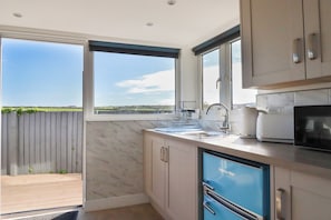 Cottage | Private kitchen | Fridge, electric kettle, toaster, cookware/dishes/utensils - Gannel Hideaway (Newquay)