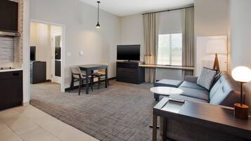 Desk, laptop workspace, blackout drapes, iron/ironing board