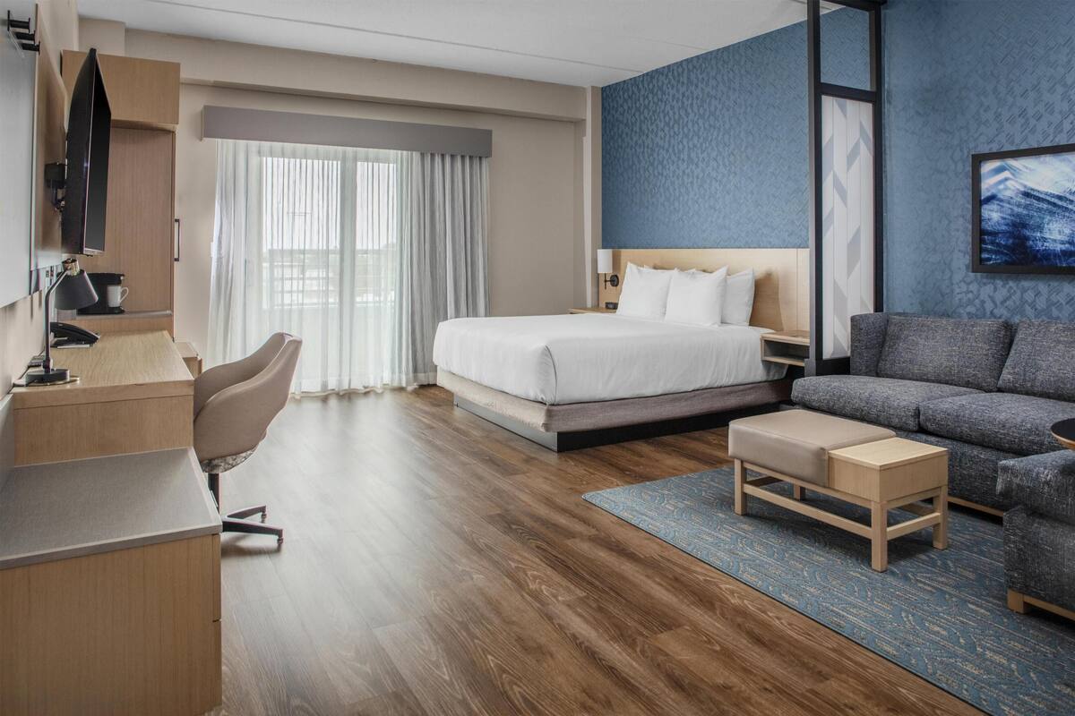 Room, 1 King Bed with Sofa bed, Balcony | In-room safe, blackout curtains, free WiFi, bed sheets