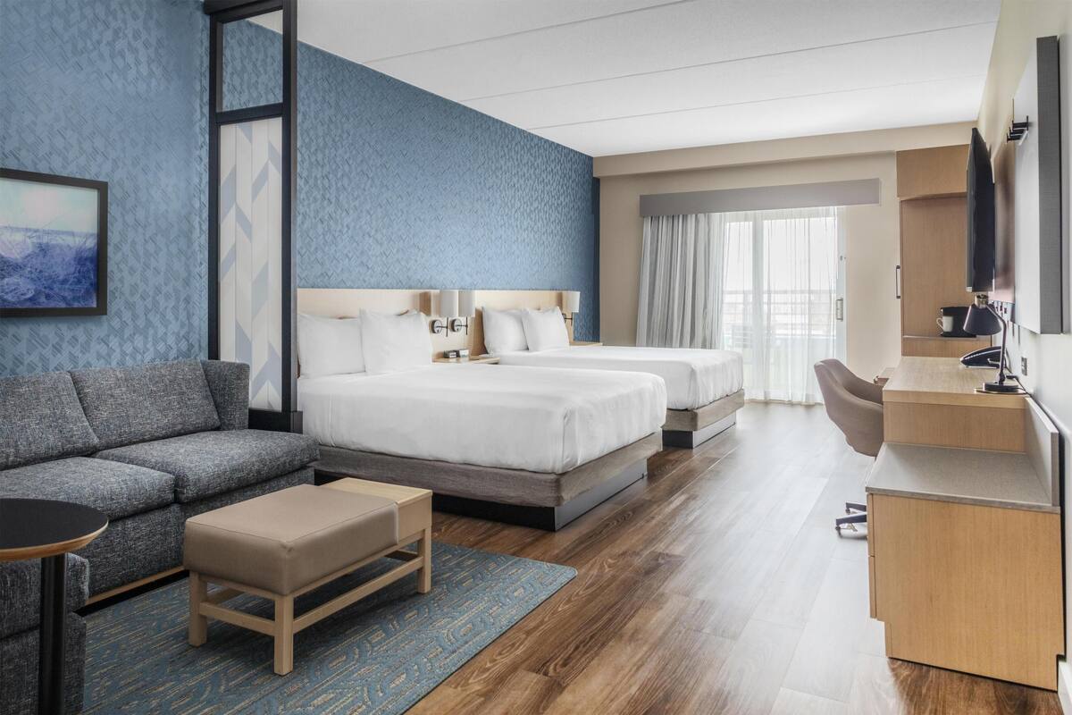 Room, Balcony (2 Queen Beds, Sofa Bed, Balcony) | In-room safe, blackout curtains, free WiFi, bed sheets