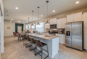Fridge, microwave, oven, stovetop - Amazing Brand New House 5 bedroom 4 bath pool Home 263 (Davenport)