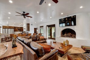 TV, fireplace - 8 BR Private Ranch w/ views, river access, pool, hot tub, pickle ball and more! (Wimberley)