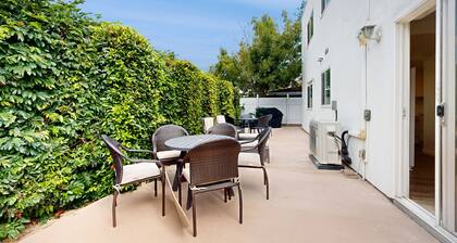 Dog-friendly two-story home with two kitchens, fast WiFi, patio, & gas grill