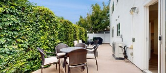 Dog-friendly two-story home with two kitchens, fast WiFi, patio, & gas grill
