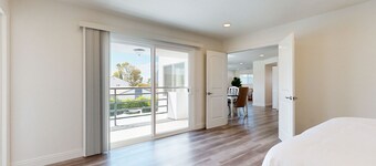 Dog-friendly two-story home with two kitchens, fast WiFi, patio, & gas grill