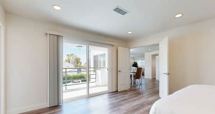 Dog-friendly two-story home with two kitchens, fast WiFi, patio, & gas grill