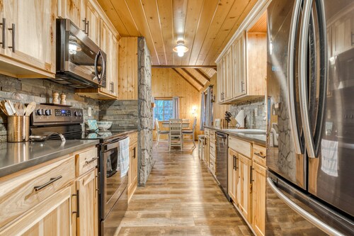 Charming, riverfront cabin with fireplace - dog-friendly