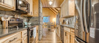Charming, riverfront cabin with fireplace - dog-friendly