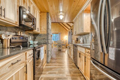 Charming, riverfront cabin with fireplace - dog-friendly