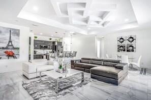 TV, foosball, table tennis, books - Dog-friendly home with outdoor kitchen, game room, cabana, pool spa & pool (Cape Coral)