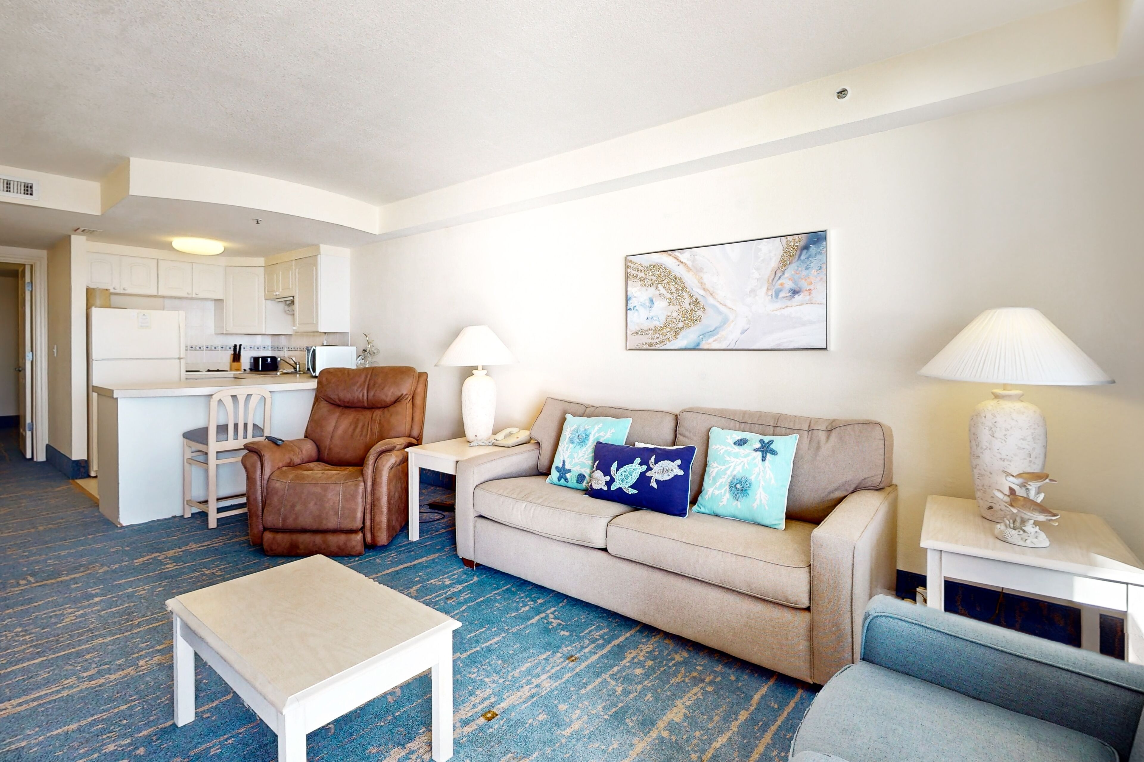 Oceanfront condo with fitness center & views