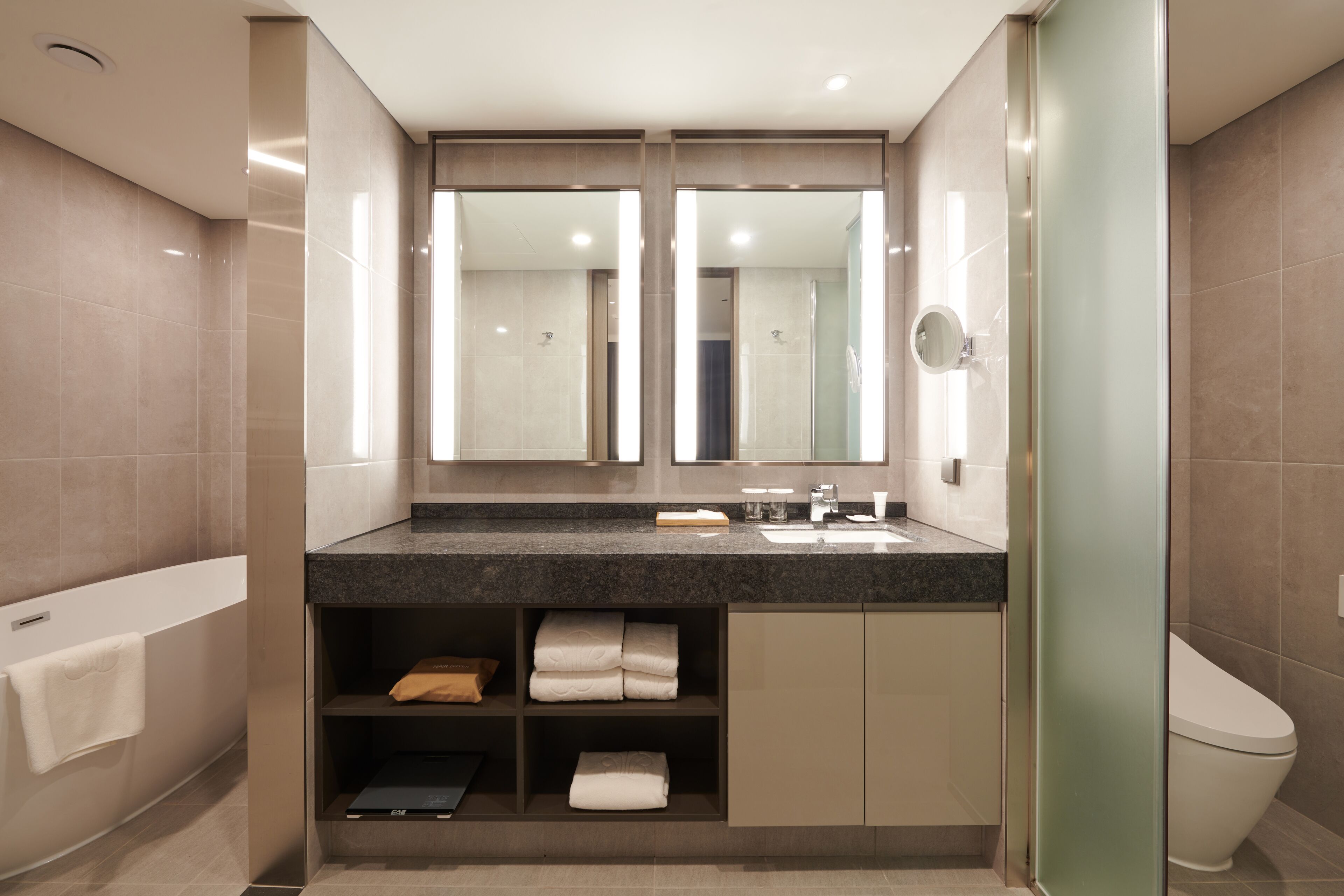 junior suite | bathroom | hair dryer, bathrobes, slippers, bidet