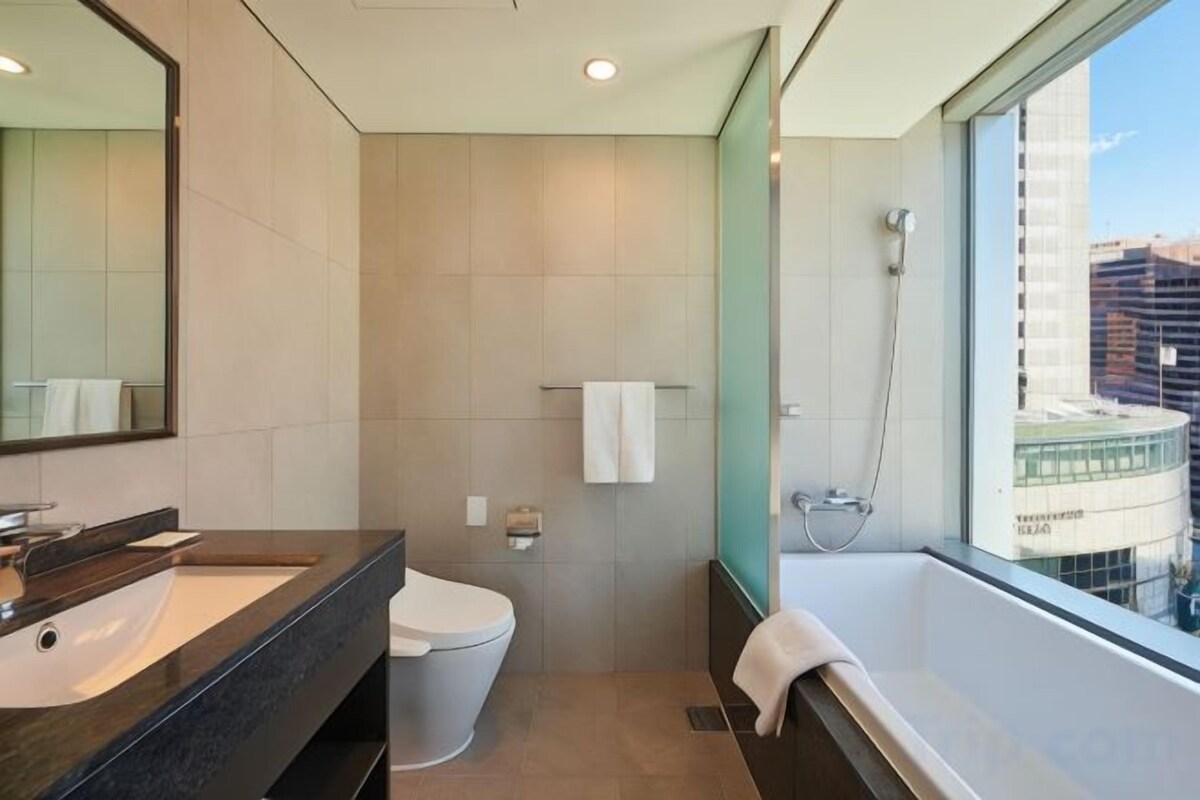 Bathroom | Hair dryer, bathrobes, slippers, bidet