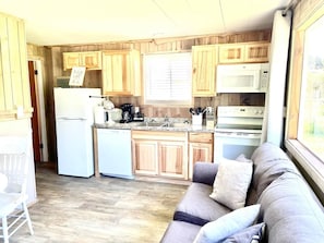Family Cabin, 1 Bedroom (Pet and Child Friendly) | Private kitchen | Microwave, coffee/tea maker