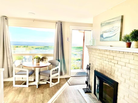 Basic Room (No Pets or Children under 16) | Living area | Flat-screen TV