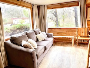 Family Cabin, 2 Bedrooms (Pet and Child Friendly) | Living area | Flat-screen TV