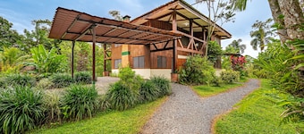 Large Home Set Into Lush Landscape with Private Pool & Gorgeous Deck Area