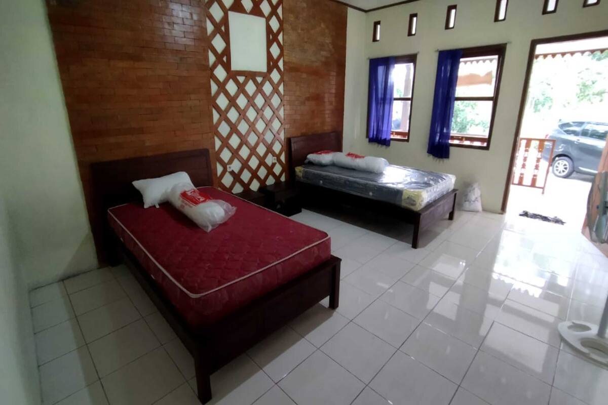 Habitación estándar con 2 camas individuales | Ropa de cama