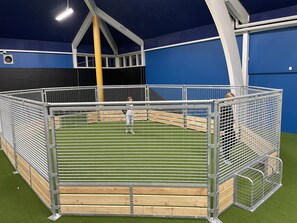 Enjoy sports and games in our indoor facility with artificial turf and spectator seating.