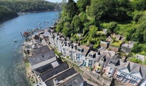 Situated by the water, this charming coastal town boasts traditional architecture with steeply pitched roofs.