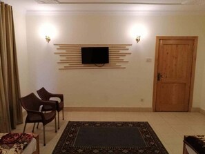 Habitación triple Deluxe | Tabla de planchar con plancha y wifi gratis