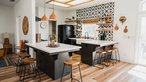 A modern kitchen with a central island, pendant lighting, and a patterned backsplash. - Sunset Glow *Hidden Meadow*BBQ HotTub by Casa Oso (Oakhurst)