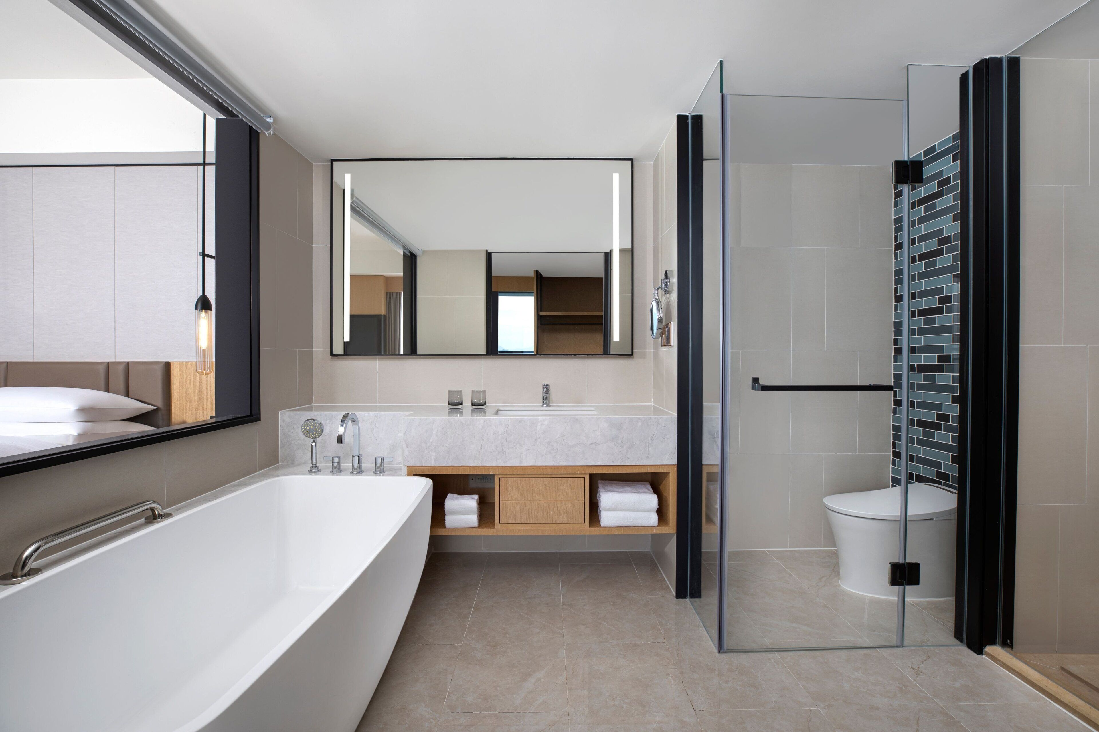 Business Suite, 1 King Bed, Balcony, City View | Down comforters, memory foam beds, in-room safe, blackout drapes