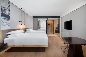 Down comforters, memory foam beds, in-room safe, blackout drapes