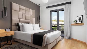 Deluxe Apartment, 2 Bedrooms, Sea View | 2 bedrooms, premium bedding, in-room safe, individually decorated