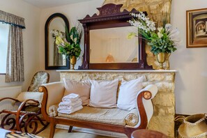 TV, fireplace, books