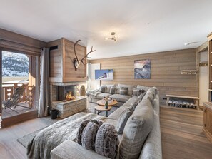 TV, fireplace - Refined apartment in Méribel with fireplace and parking (Méribel)