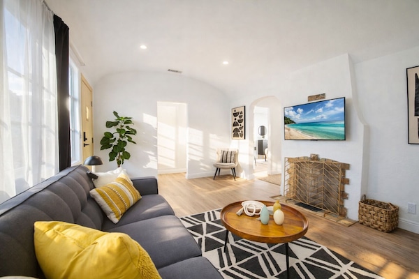 Spacious living area with natural light, cozy seating, and a modern design—ideal for families and longer stays.