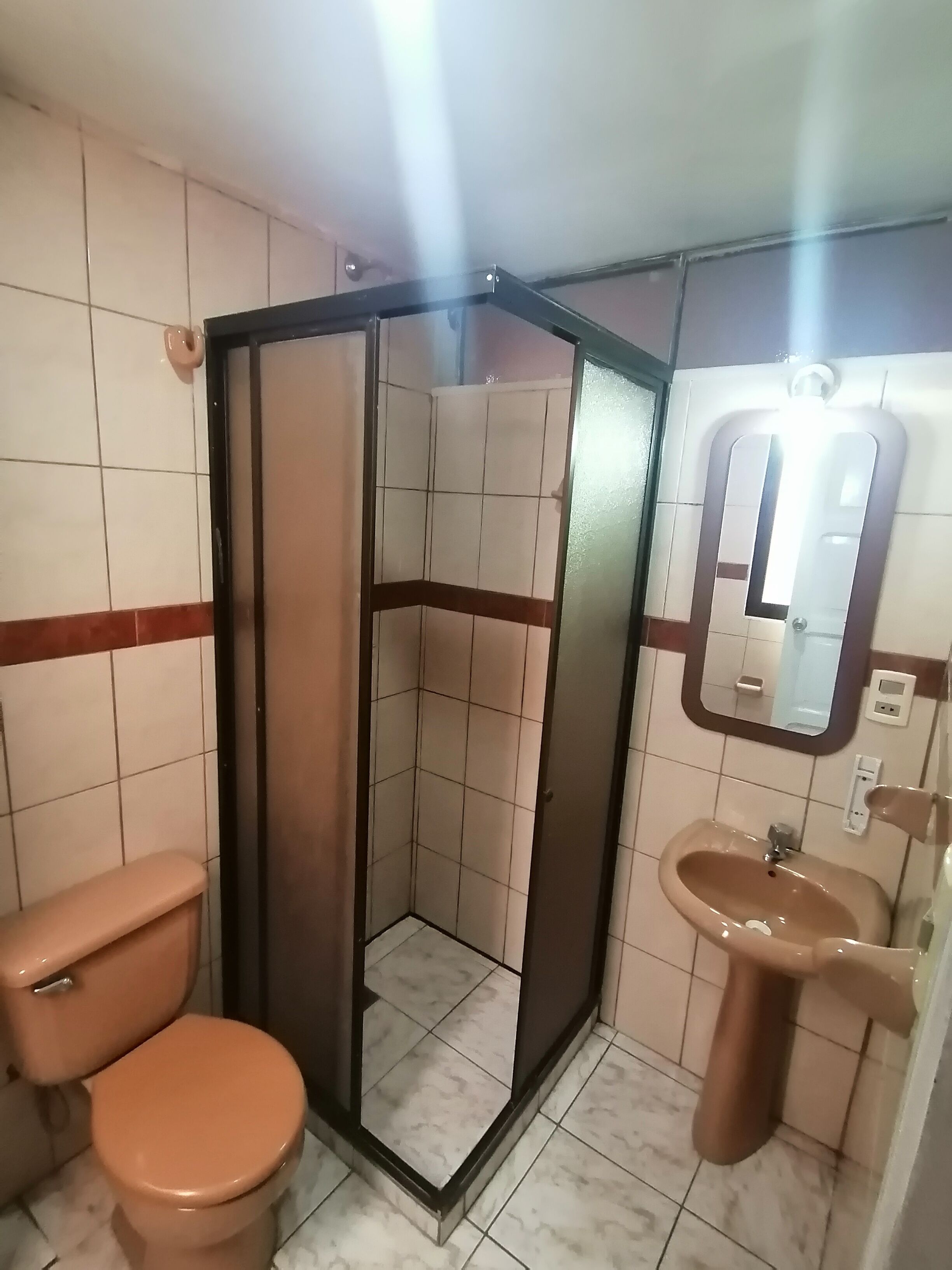 deluxe triple room | bathroom | shower, towels
