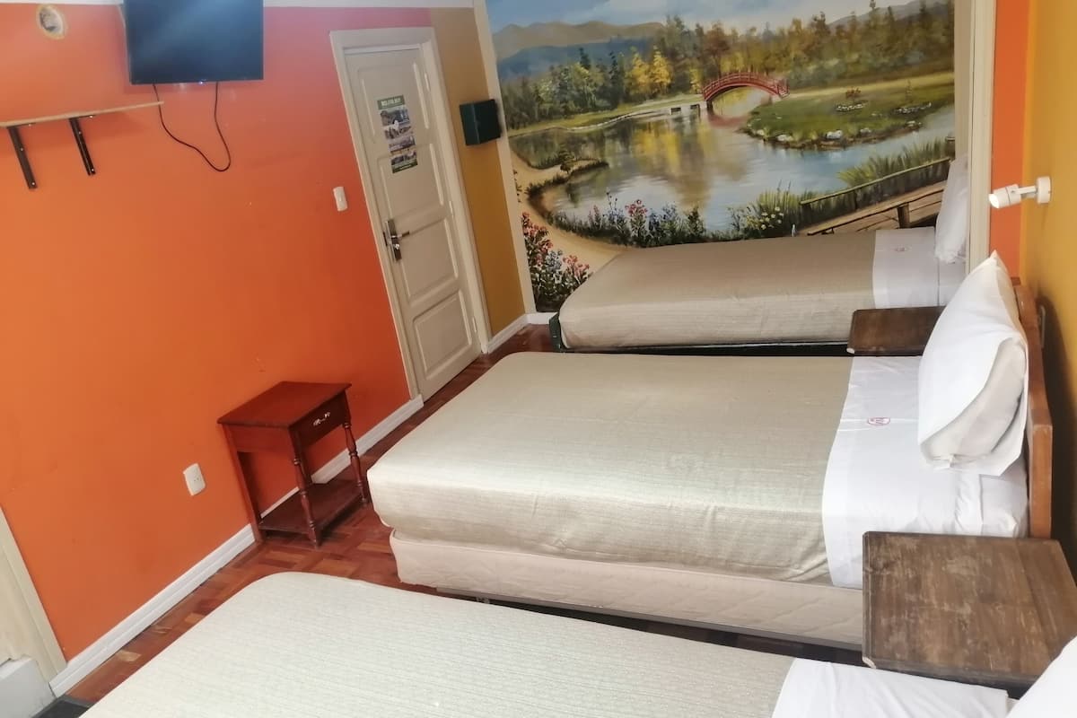 deluxe triple room | individually decorated, laptop workspace, free wifi, bed sheets