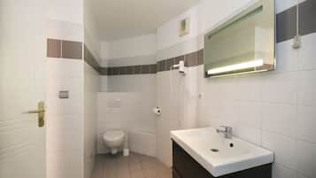 Bathtub, hair dryer, towels