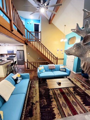 Télévision, cheminée, table de tennis de table