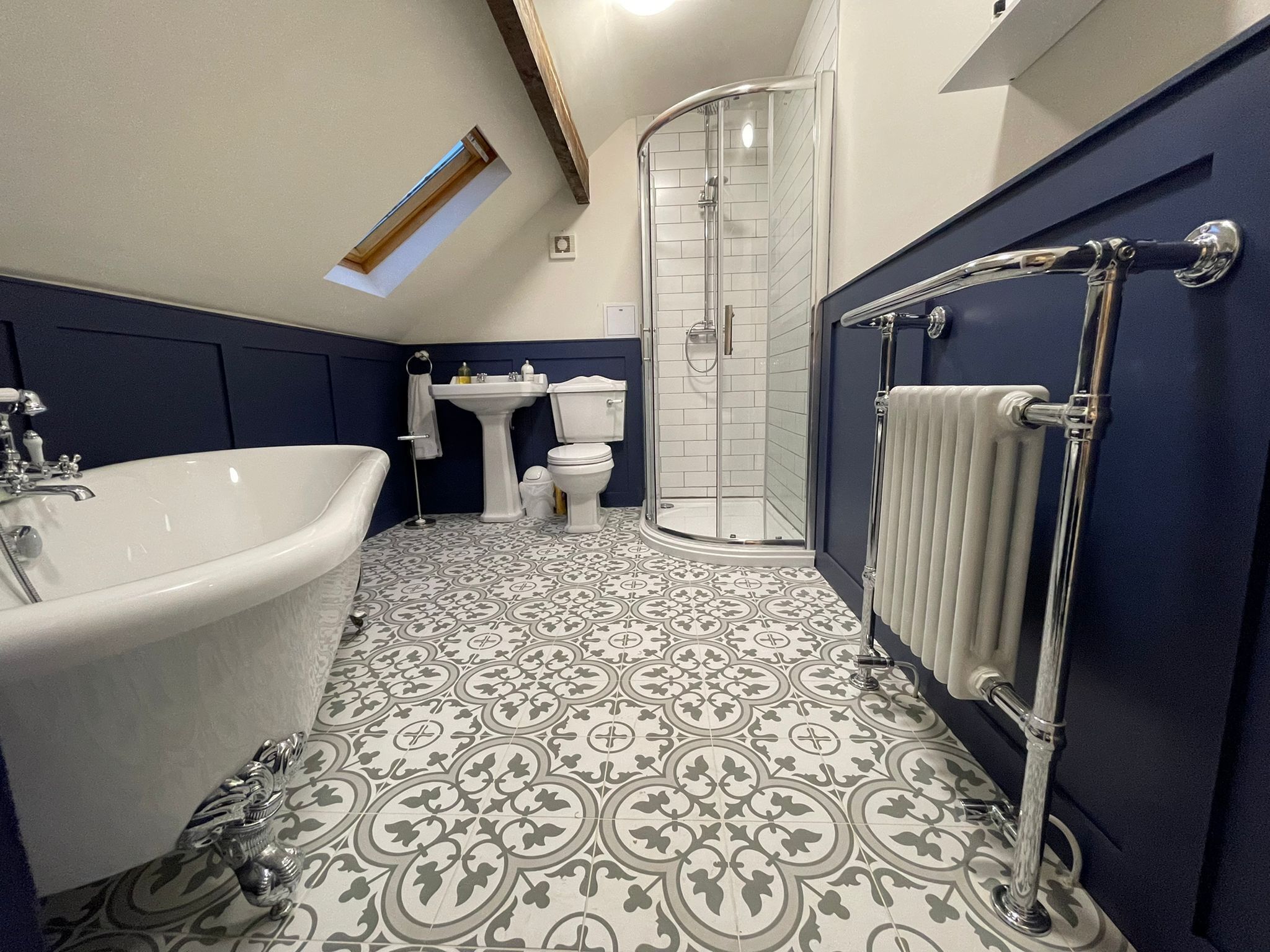 Bathtub, hair dryer, towels, soap