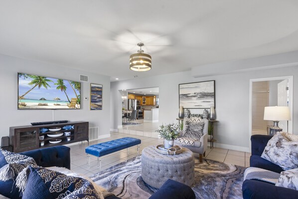 Smart TV, fireplace, books, offices