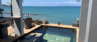 Stunning waterfront, art deco family compound cascading to the water’s edge