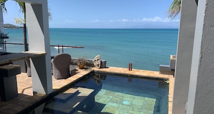 Stunning waterfront, art deco family compound cascading to the water’s edge