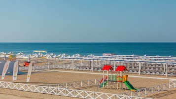 Een gratis shuttleservice van/naar het strand