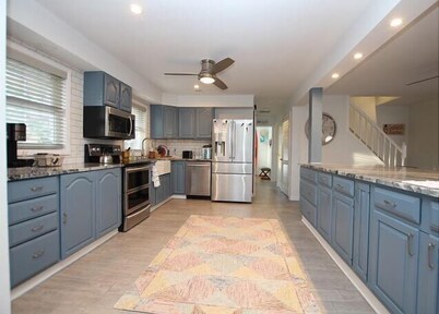 3+ Night Rentals Allowed - Large Pet Friendly Home with Fenced-In Back Yard