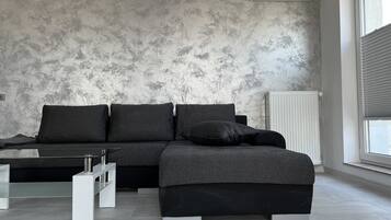 Presidential Apartment | Living room | 55-inch Smart TV with cable channels, TV, video-game console