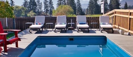 Seasonal outdoor pool, open 8:00 AM to 10:00 PM, pool umbrellas