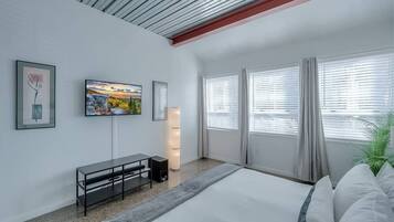 1 bedroom, desk, iron/ironing board, travel crib