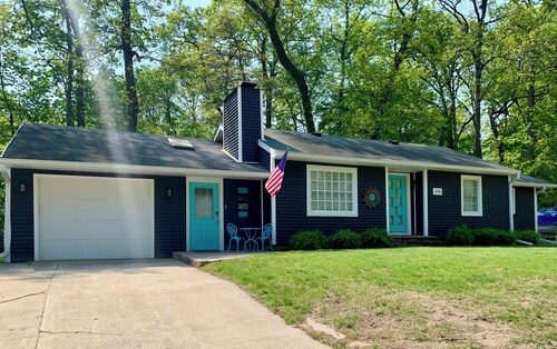 Beautiful lake-access home with boat slip steps away from renowned Clark Lake!