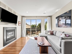 Smart TV, fireplace, DVD player, books