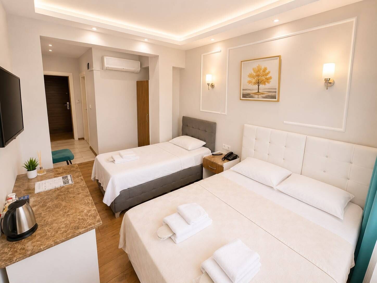 Habitación Confort con 1 cama doble o 2 individuales | Ropa de cama de alta calidad, minibar, escritorio
